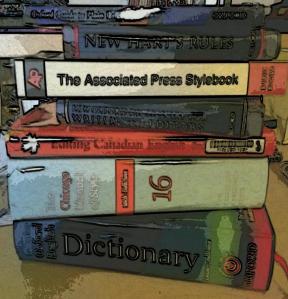 Pile of style guides and dictionaries